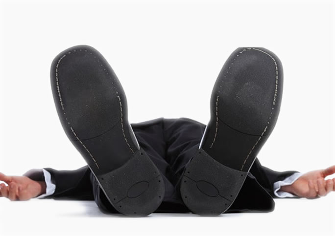 new-website-development-banner-showing-man-in-suit-passed-out-on-the-floor